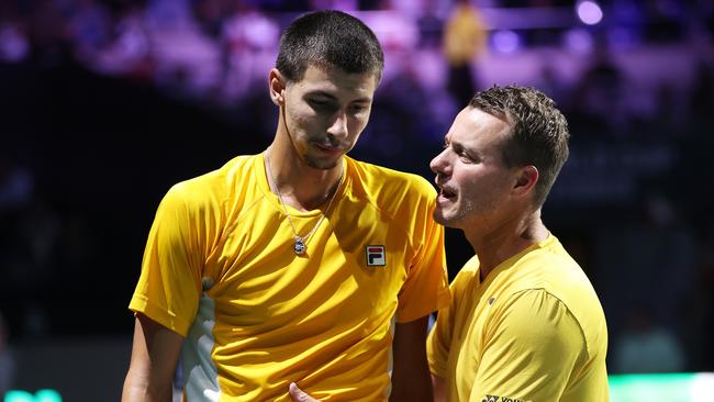 Alexei Popyrin is consoled by Lleyton Hewitt of Australia after defeat in the Davis Cup Final. (Photo by Clive Brunskill/Getty Images for ITF)