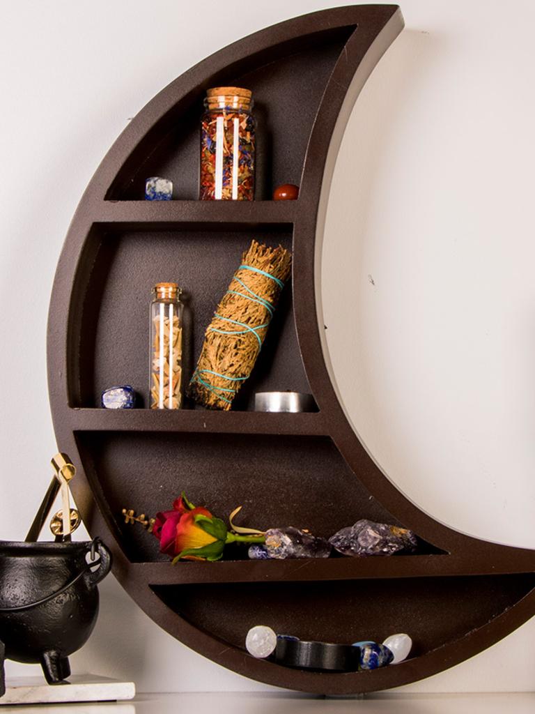 It has a range of quirky furniture items including this crescent moon shelf. Picture: Supplied