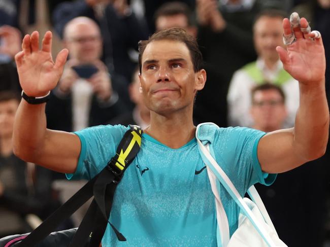 PARIS, FRANCE - MAY 27: Rafael Nadal of Spain waves to the crowd as he walks off after his defeat by Alexander Zverev of Germany in the Men's Singles first round match on Day Two of the 2024 French Open at Roland Garros on May 27, 2024 in Paris, France. (Photo by Clive Brunskill/Getty Images)