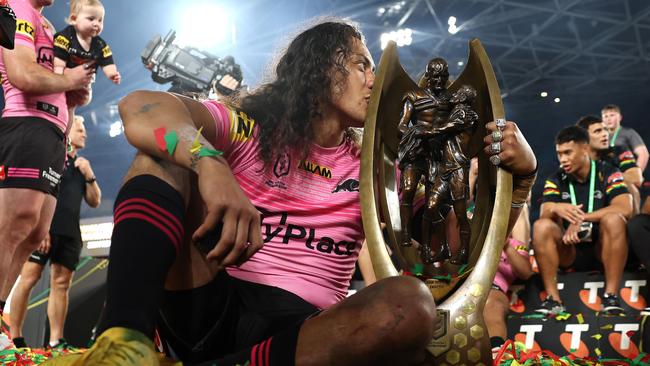 SYDNEY, AUSTRALIA - OCTOBER 06:  Jarome Luai of the Panthers poses with the Provan-Summons Trophy after winning the 2024 NRL Grand Final match between the Melbourne Storm and the Penrith Panthers at Accor Stadium on October 06, 2024, in Sydney, Australia. (Photo by Cameron Spencer/Getty Images)