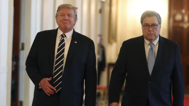 Donald Trump and Attorney General William Barr. Picture: AP.