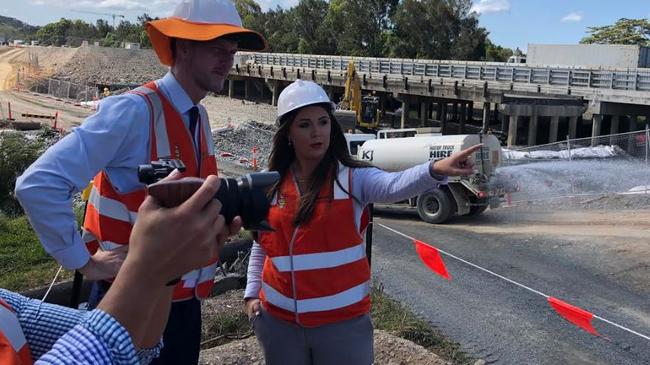 Transport Minister Mark Bailey and Gaven MP Meaghan Scanlon with transport staff on a site tour of M1 upgrades.