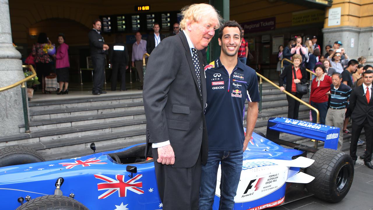 Australian Formula 1 driver Daniel Ricciardo with the late Melbourne Grand Prix Chairman Ron Walker, at a media launch for the 2015 Melbourne Formula 1 in front of Flinders St Station. Picture: David Crosling