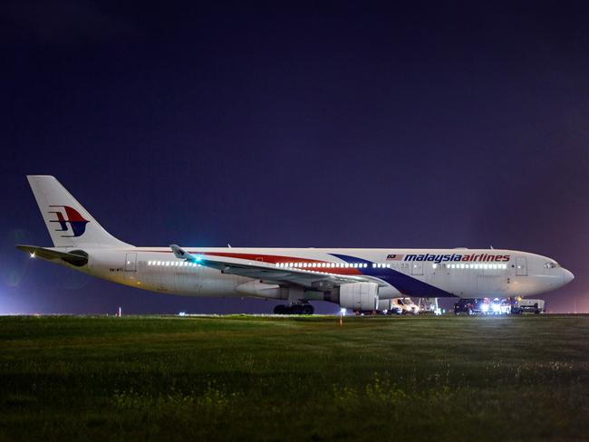 Malaysia Airlines flight MH 128 sits on the tarmac at Melbourne Airport. Picture: Gary Sissons