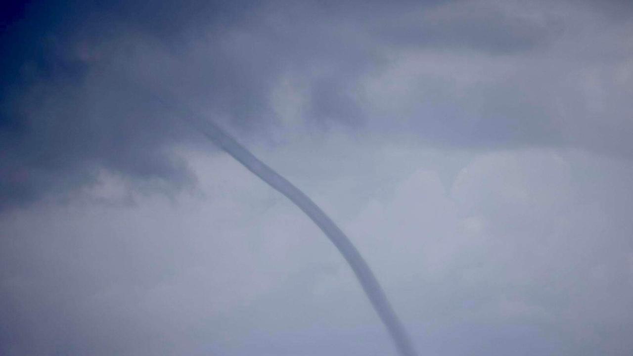 A waterspout in waters off Hervey Bay.