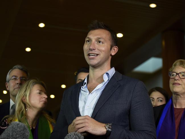 Ian Thorpe speaks to the media and celebrates the result of the marriage bill. Picture: Getty