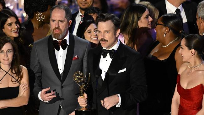 The Ted Lasso crew. (Photo by Patrick T. FALLON / AFP)