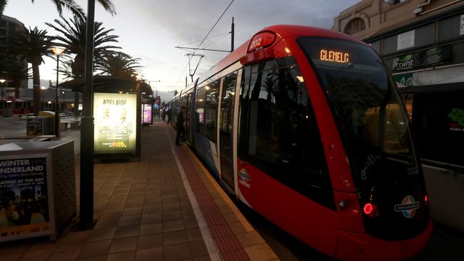 Trams on Jetty Road at sunrise. Picture: Simon Cross