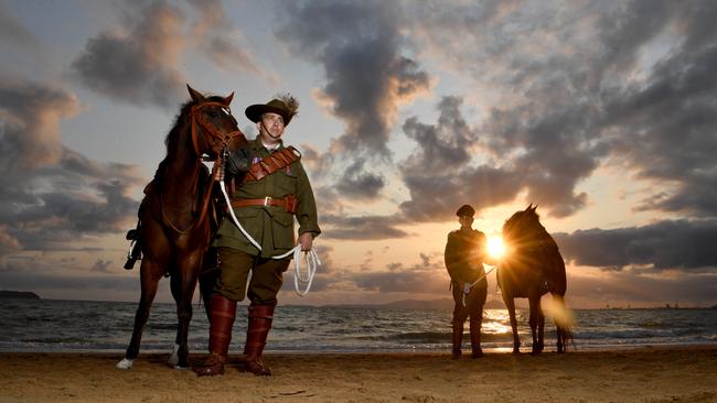 Veteran and 27th Light Horse Regiment Incorporated president Jason Mengel at Rowes Bay at dawn with Soks is set for Remebrance Day. Picture: Evan Morgan