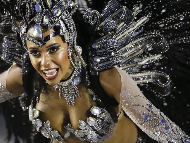 Dance off ... A performer from the Beija Flor samba school parades during carnival celebrations at the Sambadrome in Rio de Janeiro, Brazil.