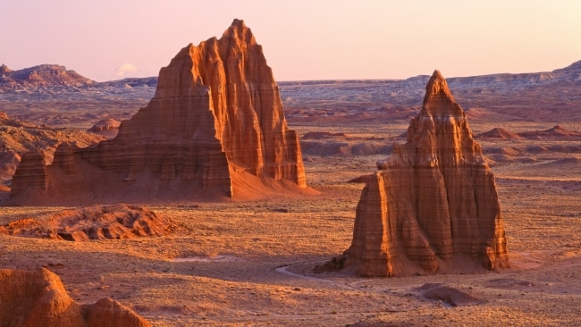 <h2>8. Capitol Reef National Park, Utah</h2><p><strong>When:</strong> Open year round but spring and autumn have the best weather.</p><p><strong>Why:</strong> Capitol Reef is Utah’s least-known park, which means fewer tourists and an experience your mates probably don’t know about yet. Despite flying under the radar, it has stunning cliffs, slot canyons and natural bridges, as well as petroglyphs. The engraved rock etchings tell the hunting, crop-growing and belief stories of the Native American Fremont and Ancestral Puebloan people who lived here from about AD600-1300. There’s also the cool new <a href="https://skyviewtorrey.com/" target="_blank" rel="noopener">Skyview Hotel</a>, just outside the park, in Torrey. The sleek property has a rooftop terrace that makes for a sublime stargazing experience in what is Utah’s first International Dark Sky Community. While there, enjoy a traditional American pie at historic Gifford Homestead, and pop into the neighbouring Mormon settlement of Fruita. </p><p><a href="https://visitutah.com/" target="_blank" rel="noopener">visitutah.com</a></p>