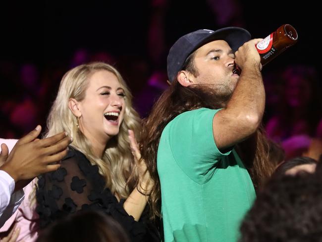 James Tidswell of Violent Soho drinks a beer on his way to accept the ARIA for Best Hard Rock/Heavy Metal from Jimmy Barnes. Picture: Getty
