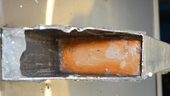 A brick of the deadly drug ice hidden in parts of the Mexican-imported machine.