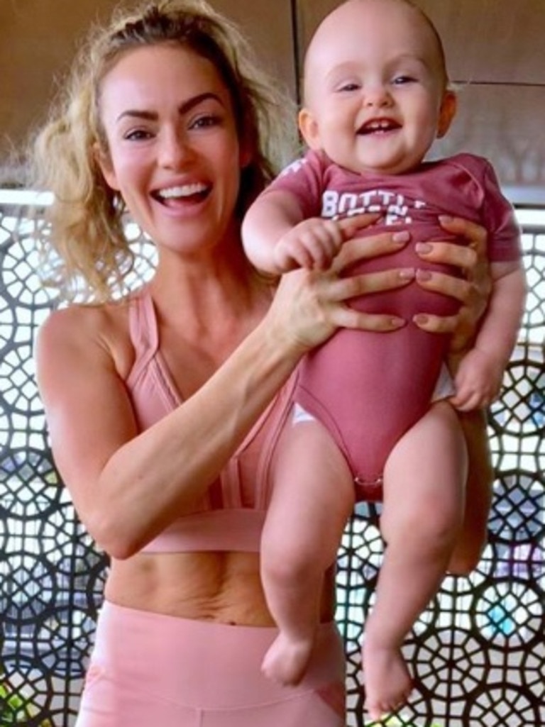 Emily Skye pictured with her bub, Mia at 10 months post-partum.