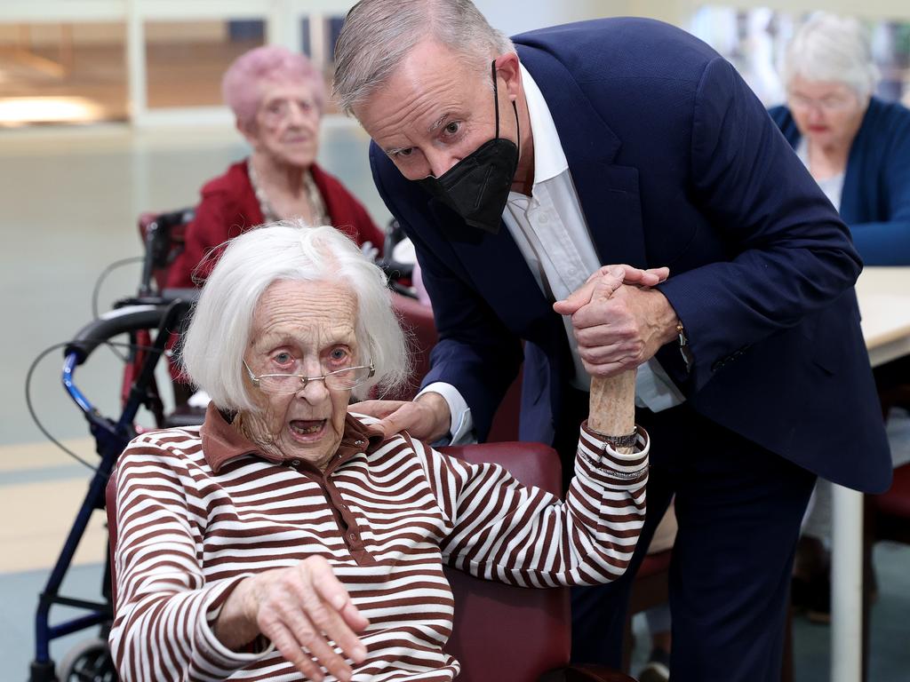 Labor leader Anthony Albanese visited Bolton Clarke Fairways Retirement Living and Residential Aged Care in Bundaberg, Queensland on Good Friday. Albo holds the hand of resident Lynda. Picture: Toby Zerna