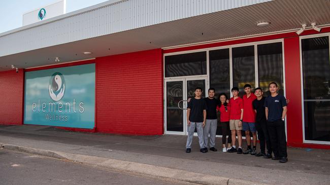 Businesswoman Jenny Um and some of her hospitality team outside her new Stuart Park business venture, Elements and Daily Eatz. Picture: Pema Tamang Pakhrin