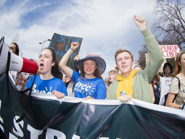 Bryher Mckewin (with mic) , Amelie Hudspeth and Toby Thorpe. Climate strike rally in Hobart. Picture: RICHARD JUPE