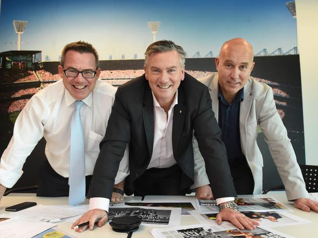 Eddie McGuire in conference with Sunday Herald Sun editor, Nick Papps, and sports editor Danny Russell. Picture: Tony Gough