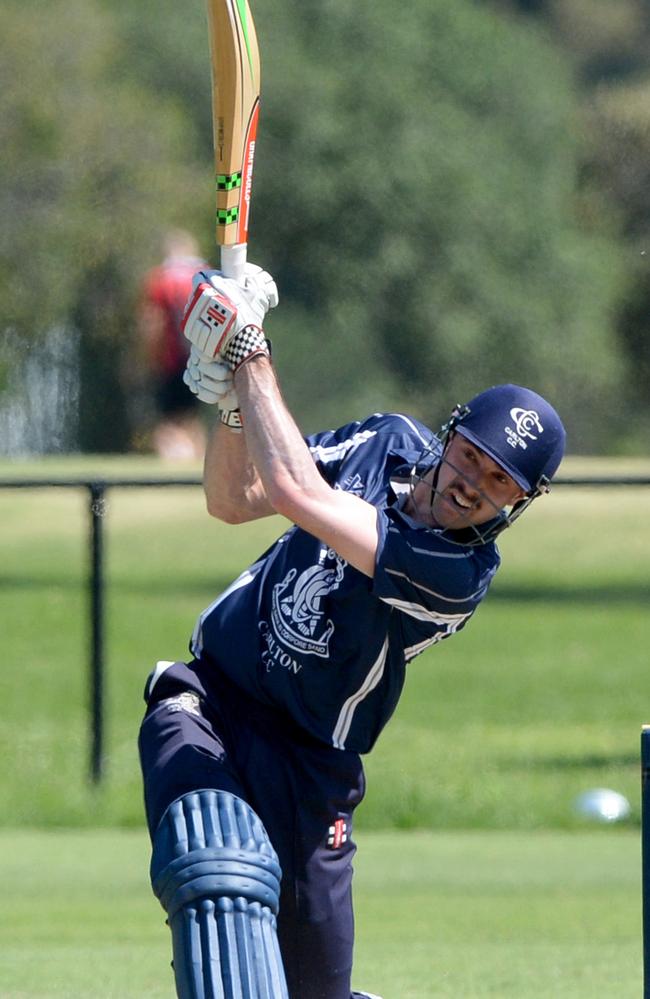 Tom Smyth hitting out for Carlton.