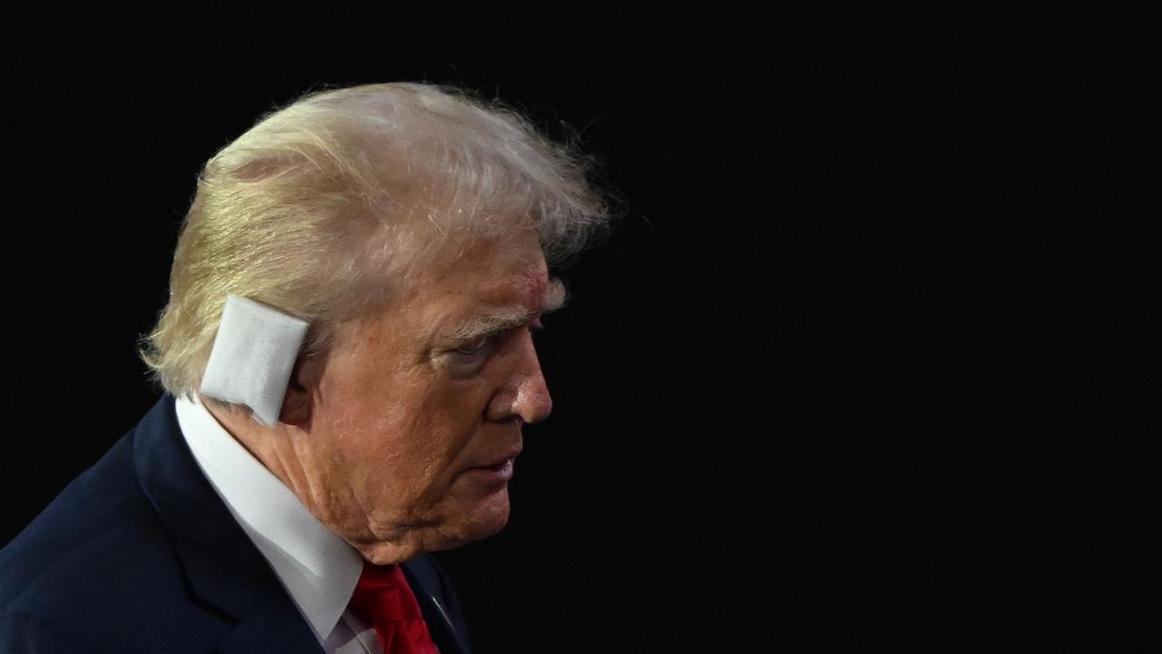 Donald Trump walks to his seat as he arrives during the first day of the 2024 Republican National Convention at the Fiserv Forum in Milwaukee, Wisconsin. Picture: ANDREW CABALLERO-REYNOLDS / AFP)