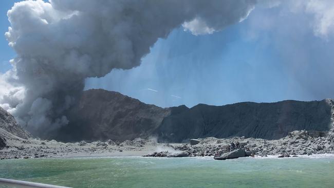 This picture courtesy of American tourist Michael Schade shows the White Island volcano spewing steam and ash minutes after Monday’s eruption.