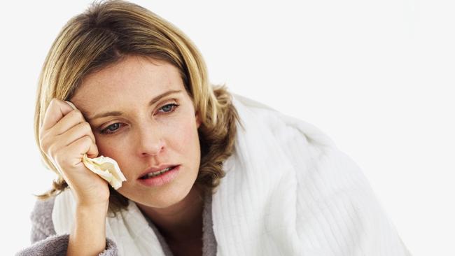 Woman with the flu. Sick. Illness. Generic image.