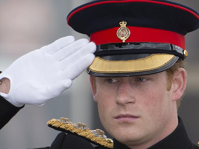 FOLKESTONE, ENGLAND - AUGUST 04:  Prince Harry takes the salute as he attends the "Step Short" commemorative event to unveil the  Folkestone Memorial Arch, to mark the centenary of the First World War on August 4, 2014 in Folkestone, England. Monday 4th August marks the 100th anniversary of Great Britain declaring war on Germany. In 1914 British Prime Minister Herbert Asquith announced at 11pm that Britain was to enter the war after Germany had violated Belgium neutrality. The First World War or the Great War lasted until 11 November 1918 and is recognised as one of the deadliest historical conflicts with millions of causalities. A series of events commemorating the 100th anniversary are taking place throughout the day. (Photo by Eddie Mulholland - WPA Pool /Getty Images)