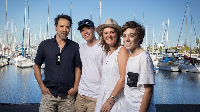 Oliver and Sebastian Zaccaria - with parents, Sergio Zaccaria and Sarah Tebbutt - are happy at their private school in Manly after moving from the Dandenong Hills. Picture: David Kelly