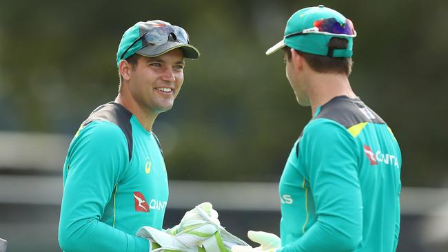 Present and future Test keepers Alex Carey and Tim Paine talk during an Australia’s one-day training camp in Brisbane. Picture: Chris Hyde/Getty Images