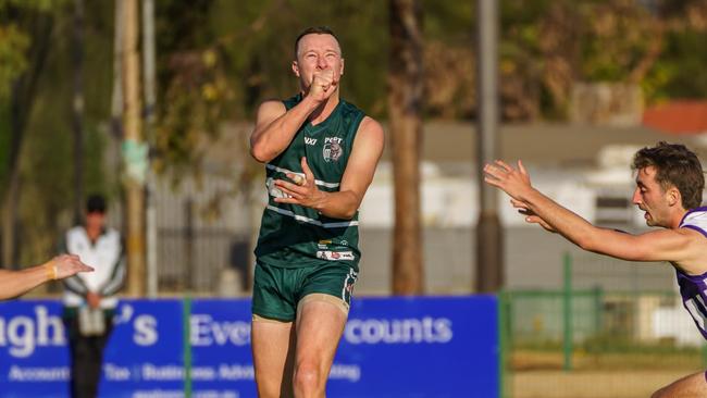 Port's Tom Edwards gets a handball away. Picture: Port Football Club