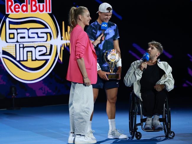 Dylan Alcott interviews Holger Rune of Denmark after winning against Casper Ruud of Norway during their Red Bull Bassline final. Picture: Kelly Defina/Getty Images