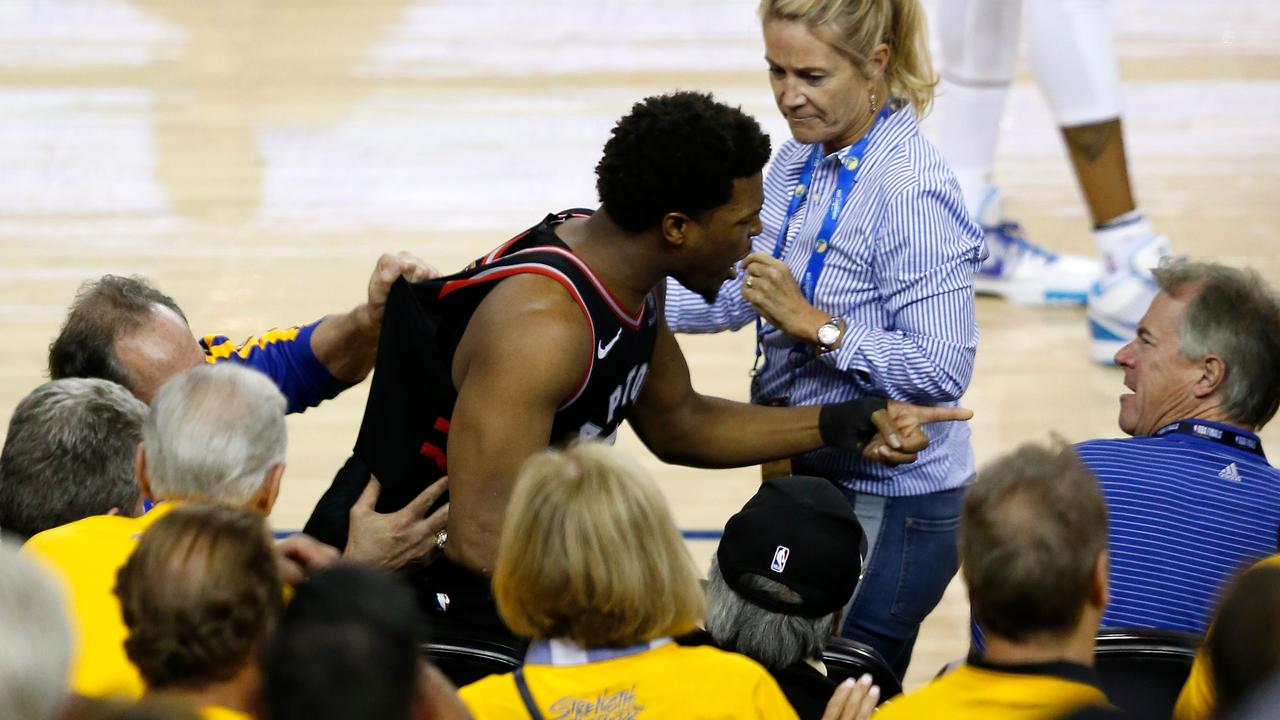 Kyle Lowry yells at investor Mark Stevens after being pushed.