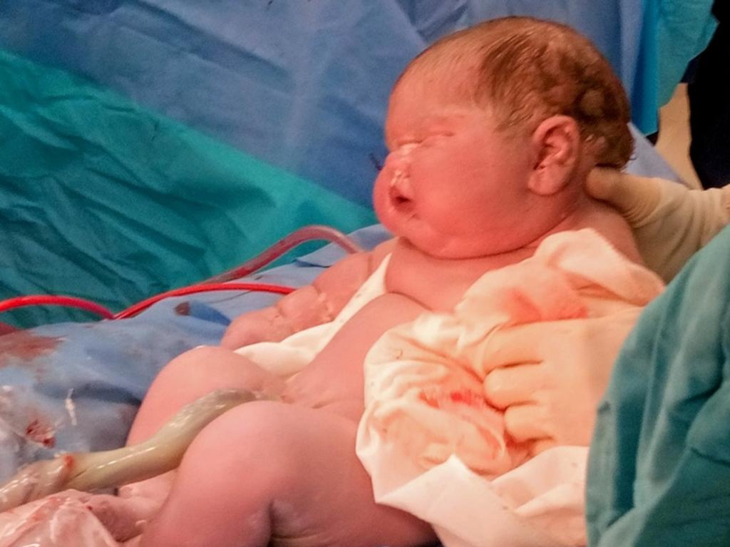Cherral Mitchell gave birth to a baby weighing more than 6kg. Picture: SWNS/Mega