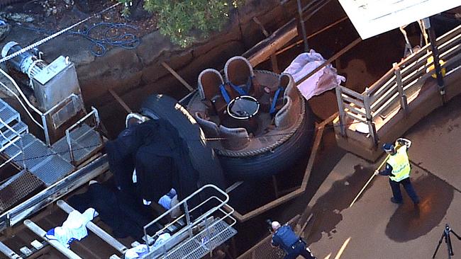 Police inspect the Thunder River Rapids ride in the aftermath of an accident that killed four people. Picture: AAP Image/Dan Peled