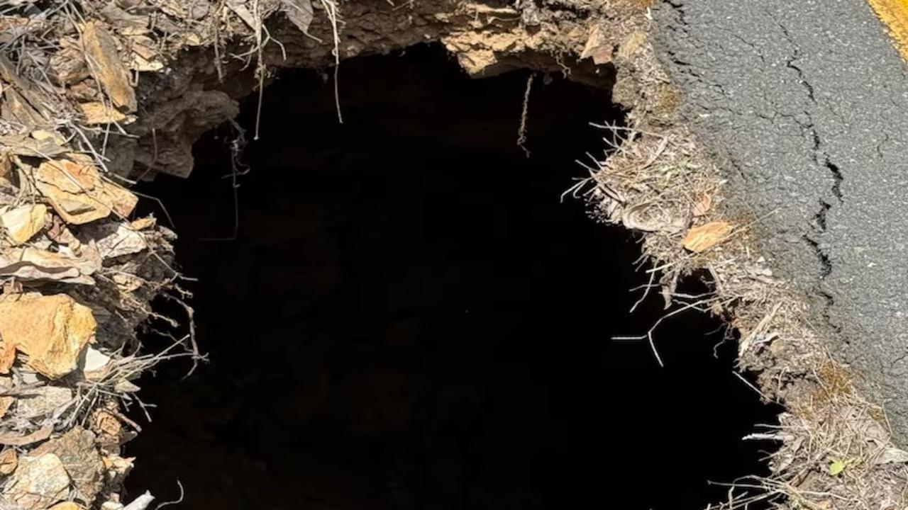 The sinkhole was caused by the collapse of a disused mine shaft. Picture: Supplied/Department of Transport.