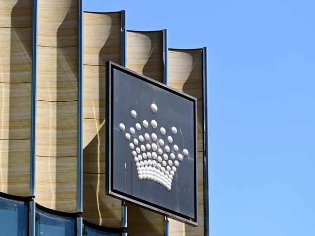 A Crown Casino logo adorns the side of the premises in Melbourne on February 14, 2022, after Australian casino giant Crown Resorts said it will ask shareholders to approve an 6.4 billion USD takeover offer from US private equity firm Blackstone. (Photo by William WEST / AFP)