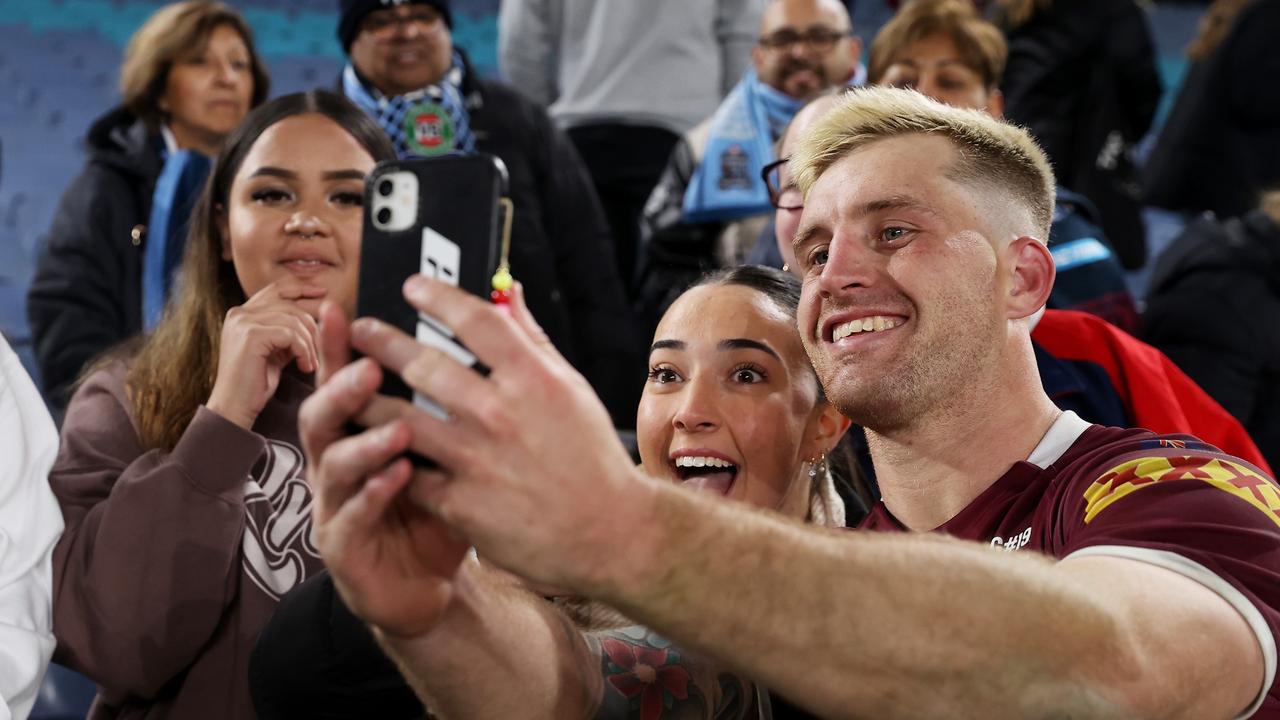 Cameron Munster was mobbed by Maroons fans after Queensland’s win in Origin I at Accor Stadium. Picture: Mark Kolbe/Getty Images