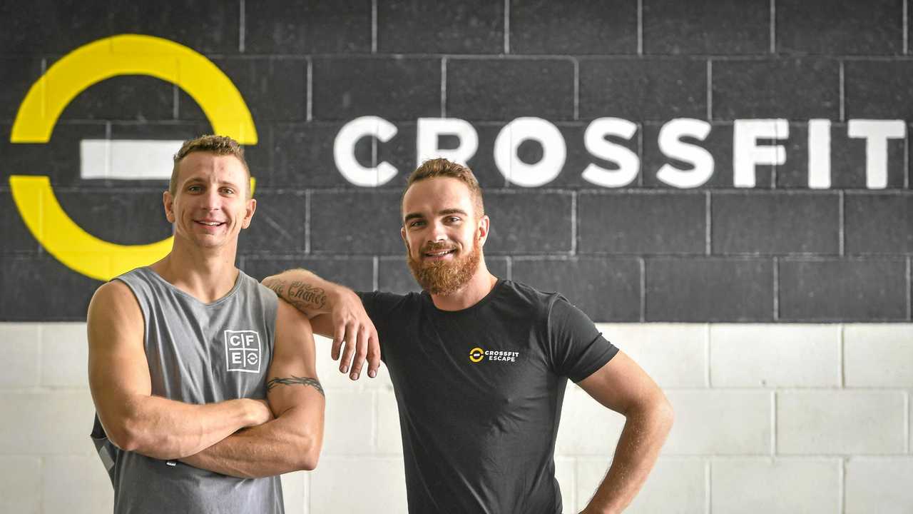 Troy Robinson and Travis Williams own the new Cross Fit gym called CrossFit Escape on Side Street in West Gladstone. Picture: Matt Taylor GLA020619XFIT