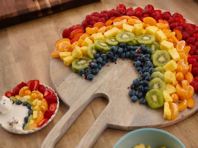 Meghan Markle shows how to make a rainbow of fruit. Picture: Netflix