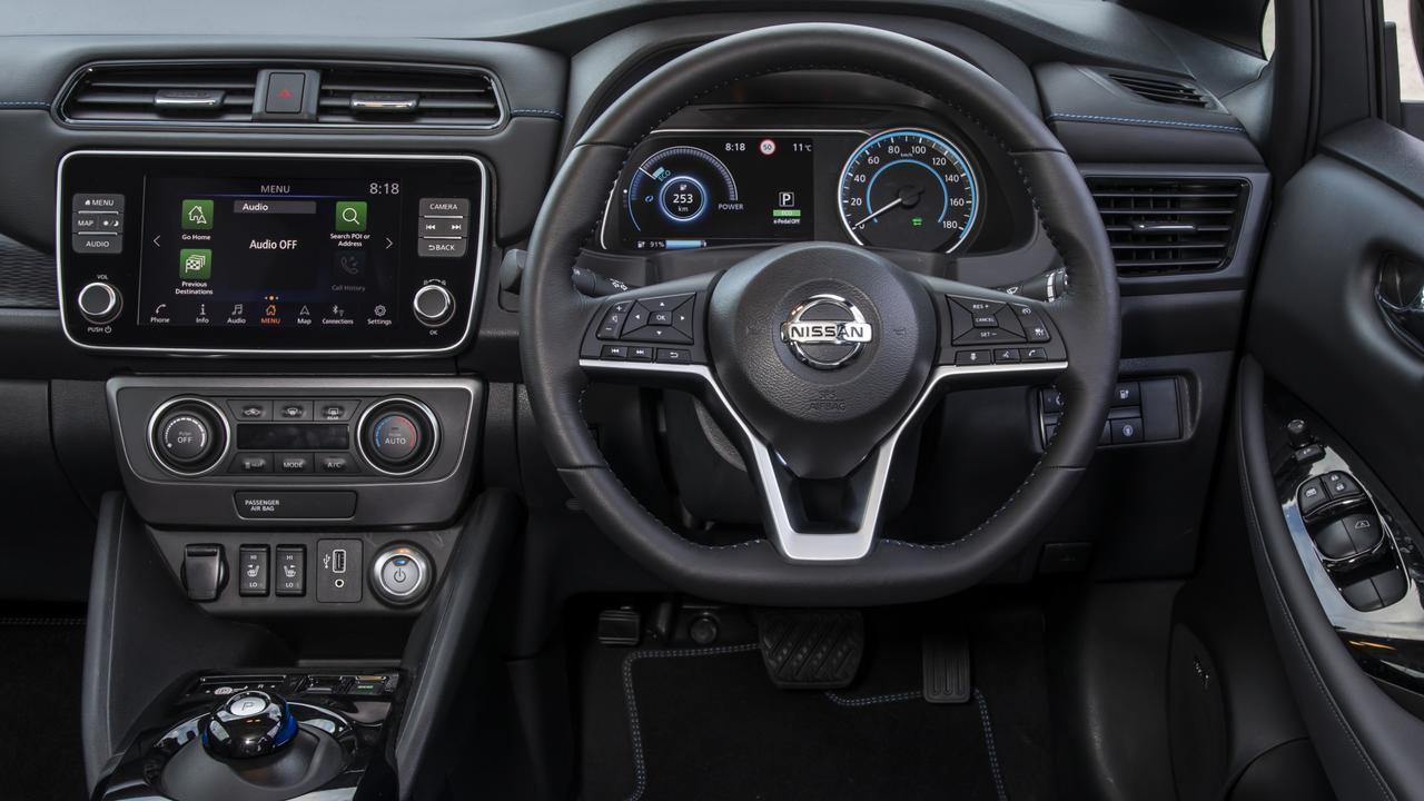 The Leaf has a high seating position and lower steering wheel.