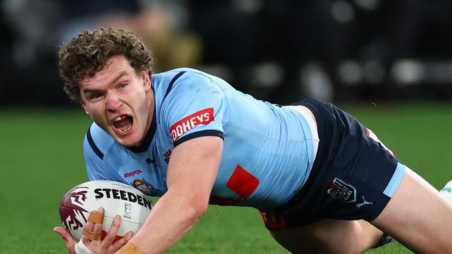 Liam Martin of the Blues celebrates after scoring the opening try. (Photo by Quinn Rooney/Getty Images)