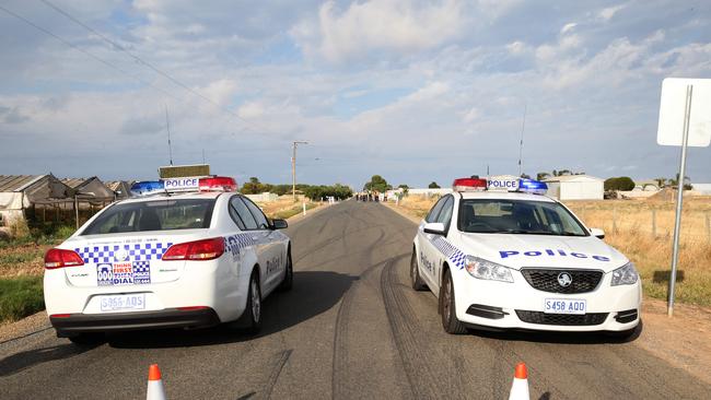 Emergency services at the scene of a serious crash after pedestrian was struck by a car. Picture: Stephen Laffer