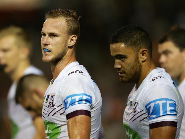 Daly Cherry-Evans and Dylan Walker after the Tigers score a try. Sydney. Pic Brett Costello