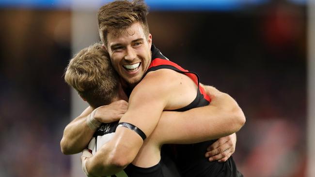 PERTH, AUSTRALIA - MAY 29: Jake Stringer of the Bombers celebrates after scoring a goal during the 2021 AFL Round 11 match between the West Coast Eagles and the Essendon Bombers at Optus Stadium on May 29, 2021 in Perth, Australia. (Photo by Will Russell/AFL Photos via Getty Images)