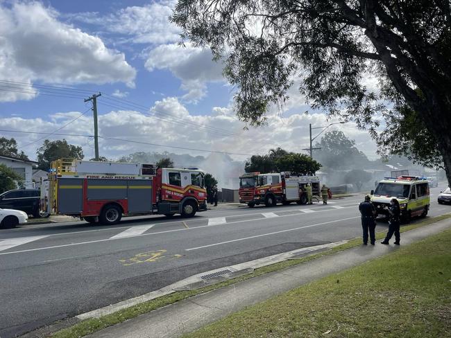 Fire engulfed a home north of Brisbane on Friday afternoon after a battery explosion in the garage. Picture: Dean Halpin