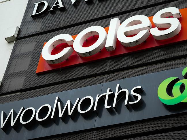 MELBOURNE, AUSTRALIA - MARCH 13: Woolworths and Coles supermarket signage on March 13, 2024 in Melbourne, Australia. Australia's two major supermarket chains, Coles and Woolworths, have come under scrutiny for their role in the cost of living crisis in the country, with both companies significantly increasing their profits during the pandemic while consumers faced rising living costs, local media reports said. Former cabinet minister Craig Emerson is leading a government inquiry into supermarket pricing practices, while former ACCC chair Allan Fels is conducting a separate investigation in collaboration with the Australian Council of Trade, ABC News said. (Photo by Asanka Ratnayake/Getty Images)