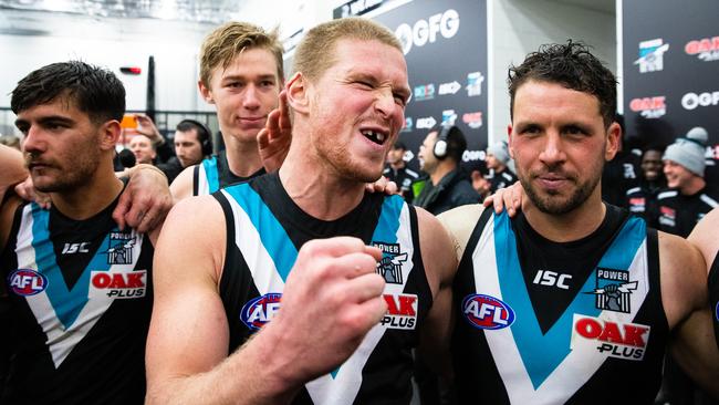 Clurey celebrates Port Adelaide’s win over Sydney last week with Travis Boak. Picture: Daniel Kalisz (Getty).