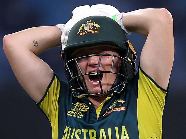 DUBAI, UNITED ARAB EMIRATES - OCTOBER 11: Alyssa Healy of Australia grimaces as she walks off after picking up an injury during the ICC Women's T20 World Cup 2024 match between Australia and Pakistan at Dubai International Stadium on October 11, 2024 in Dubai, United Arab Emirates.  (Photo by Alex Davidson-ICC/ICC via Getty Images)