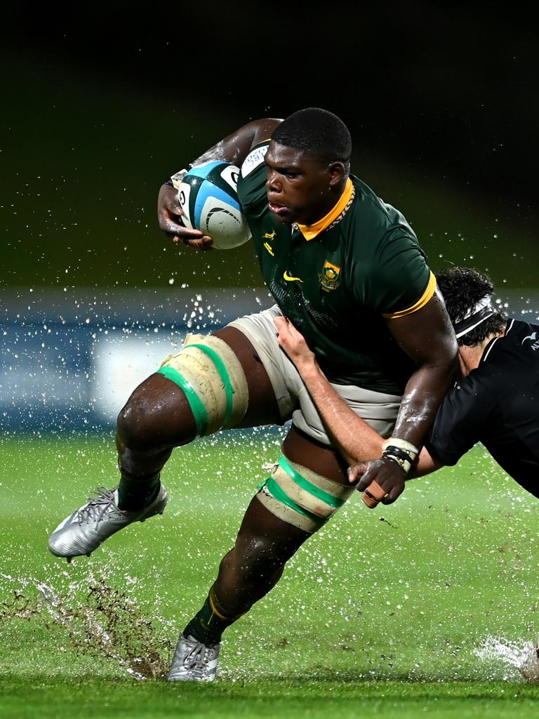 Bathobele Hlekani of South Africa is tackled. Picture: Albert Perez/Getty Images.