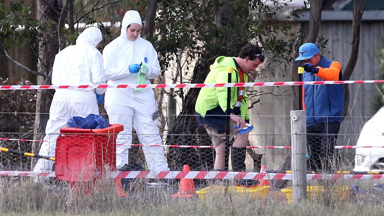 Workers at the Meredith Chicken Farm in Victoria go through a cleaning station before entering the farm that has been hit with an Avian outbreak. Picture: Mike Dugdale
